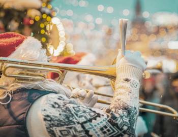 christmas parade person playing instrument