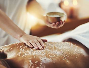 woman getting an exfoliating massage