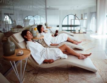 people relaxing in a spa