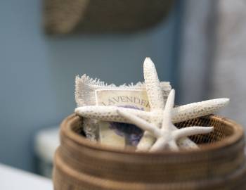 starfish and lavender in wooden vase