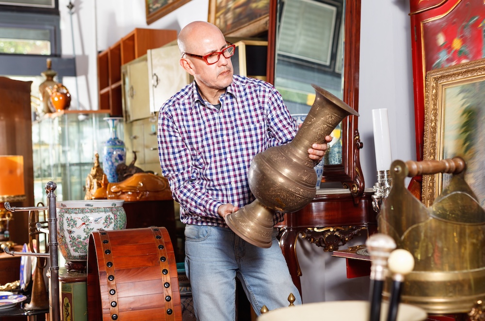 man shopping for antiques