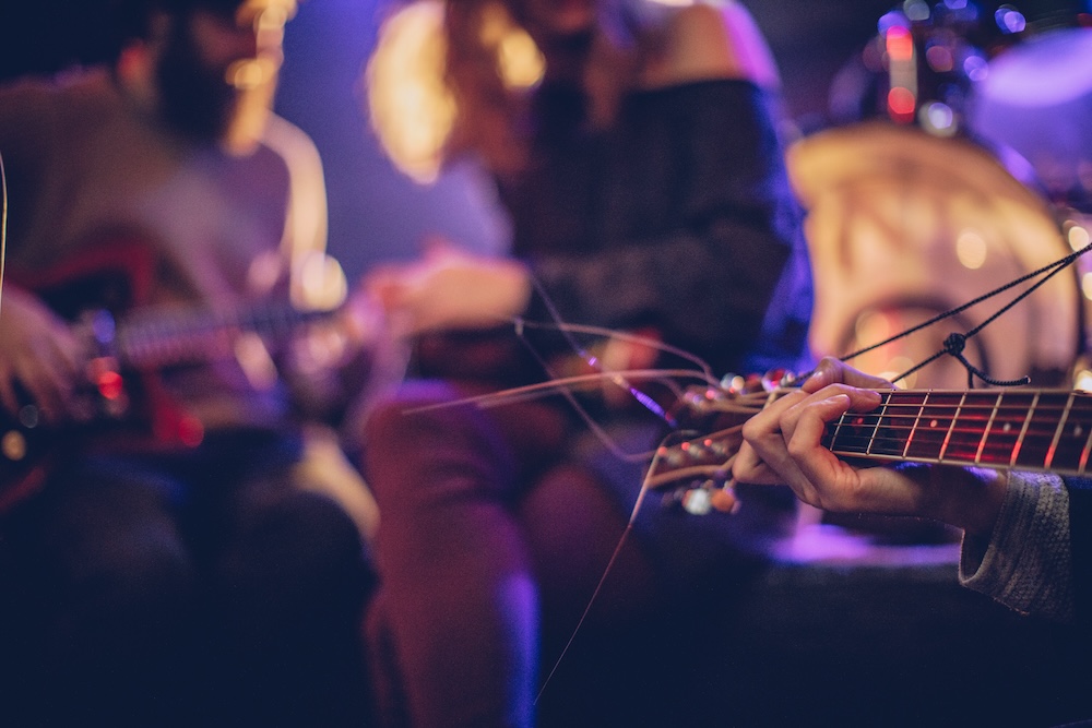 people playing music on stage